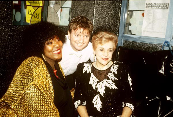 MrGayUK's tweet photo. Throwback to 1993: Rustie Lee, club owner Basil Newby &amp; Carmen Silvera judge #MrGayUK 1993 at Flamingo Club Blackpool. The winner was Anthony Morley representing Doncaster. https://t.co/Az95DpP57f