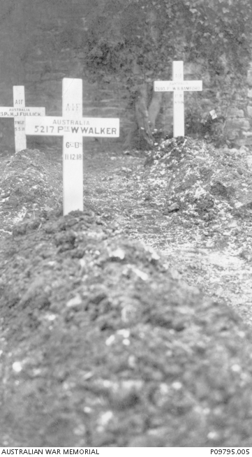 Before that, simple crosses were used. Here is Private Walker's grave.