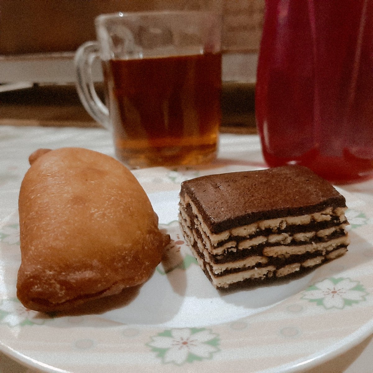 DAY #2 ㅡ 25/04 06:13 PMbisquit brownies cake, panada, and a glass of tea as my iftaar meal