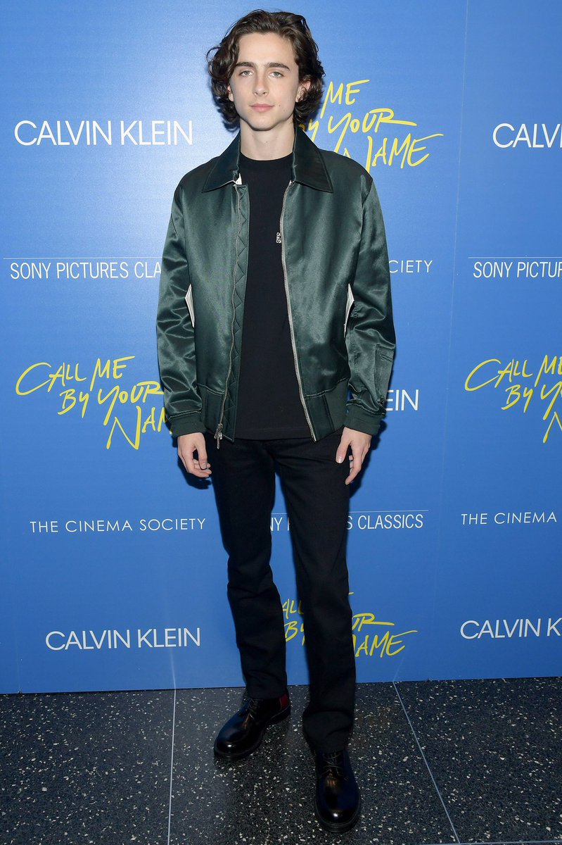 Timothee Chalamet Cooly Styles Shearling Bomber Jacket and Denim Kicks –  Footwear News