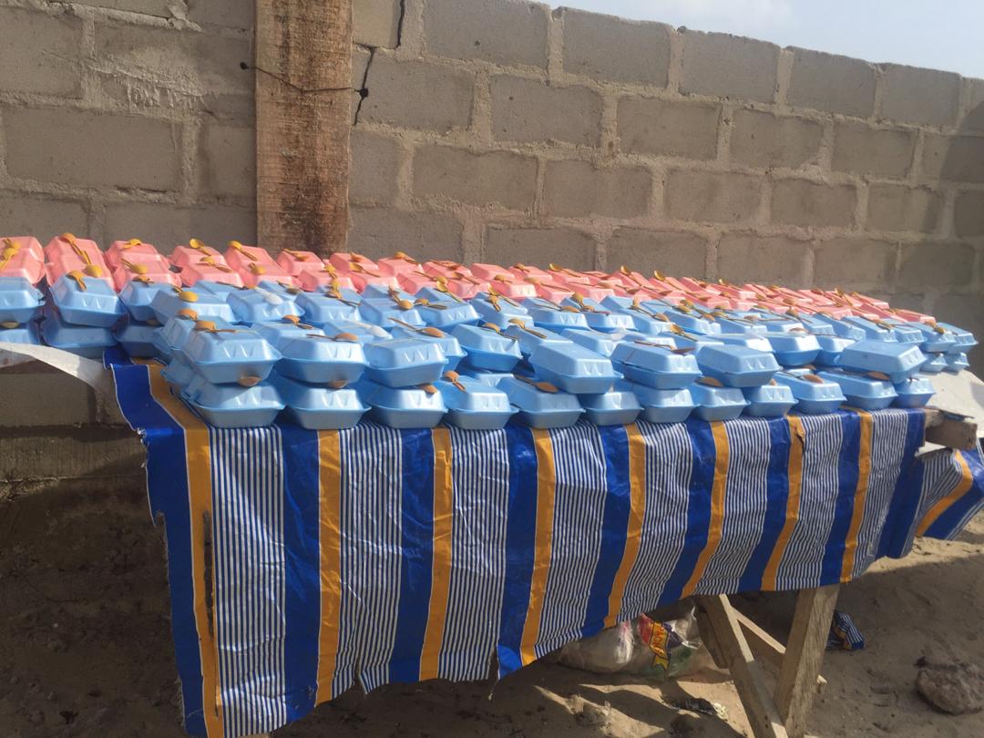 TheDestinyTrust's tweet photo. Raliat drags her sister along as she hurries to the food point. They were late to lunch today but not too late to get a meal. There was enough for all the children because you paid for it. Thank you our friends! #Covid_19 #lockdown #communityfeeding https://t.co/MPtZRC0KBb