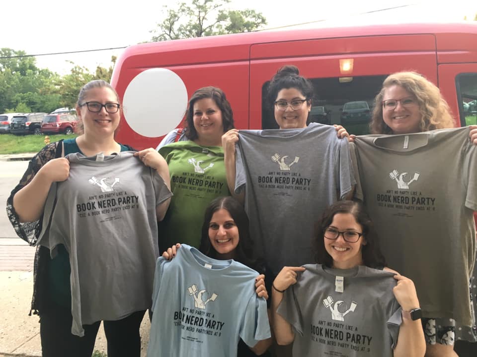 lawrencelibrary's tweet photo. Kimberly leads the YA for Grownups Book Club. This book club was started over four years ago, with the idea to provide a judgment-free space for grownups to discuss young adult books, and that’s exactly what they do! #BookClubParade https://t.co/oiGKwyJmv9
