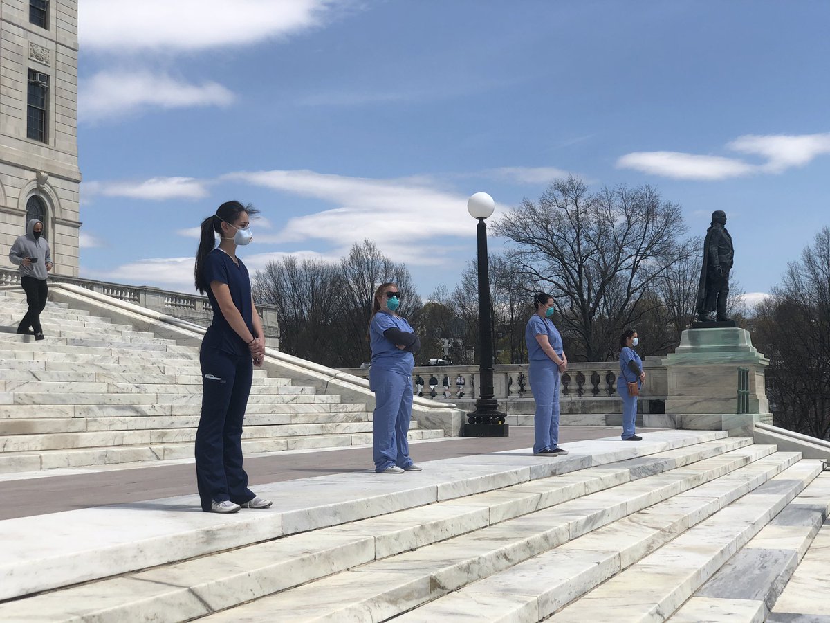 Brave healthcare workers counter protesting the “Reopen RI Rally.” Just over 50 people here.  @UpriseRI