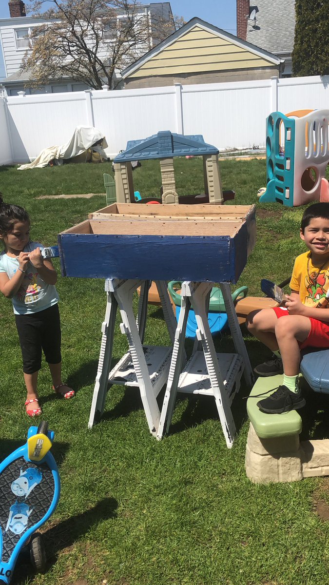 Painting the garden beds, for our veggies