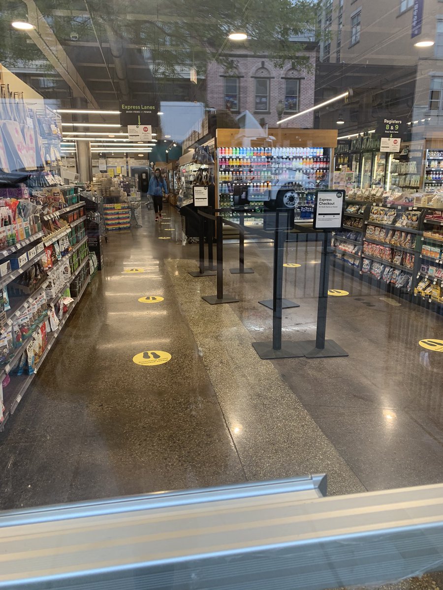 More absurd grocery store policies: There is a 35 minute wait outside of  @wholefoods because they don’t want to overcrowd the grocery shop itself— which is empty. Picture 1 is the checkout line inside— picture 2 is the halfway point of the line outside to get in.  #coronavirus