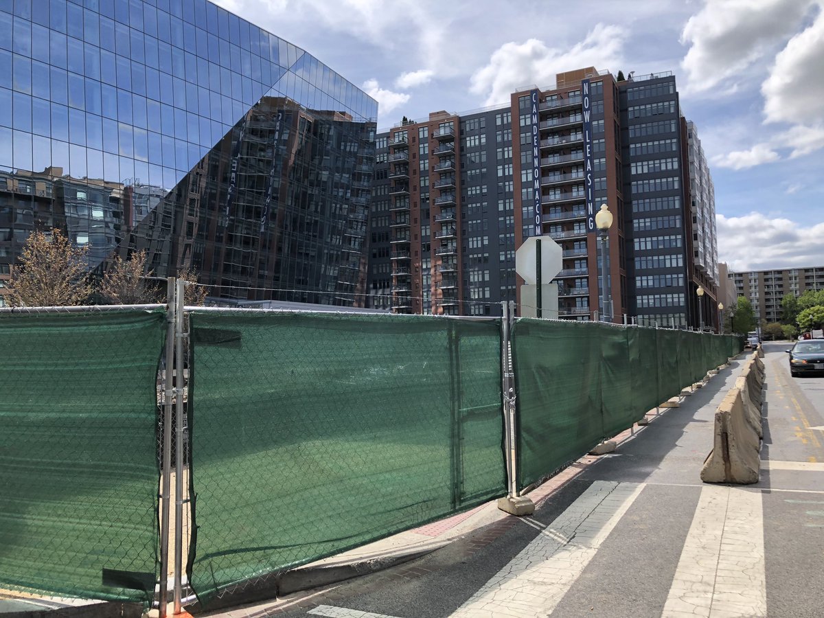One block north at 1150 First St. NE, there is fencing up but not much work happening on this site, acquired last year by multifamily developer Carmel Partners