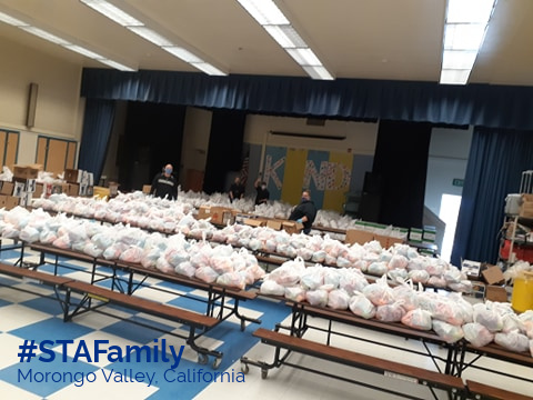 RideSTBus's tweet photo. Have you ever wondered what 1000s of prepared lunches look like? #Busdrivers + #dispatchers from our operation in @MorongoUnified have been working tirelessly to help prepare + deliver meals to students and community members in need. #STAFamily #SchoolBusHero #MealsOntheBus https://t.co/Ca8v2dMT7a