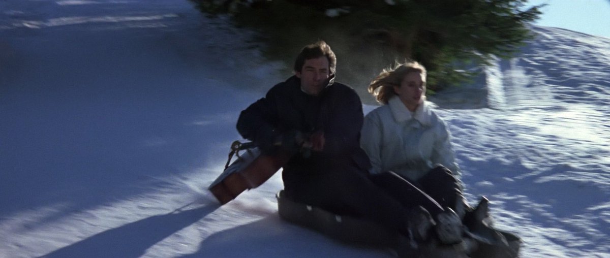 Just when I thought I was safe, Bond found another reason to go skiing, but with a F@CKING CELLO?!??   #TheLivingDaylights (1987) #Bond25  #JamesBond  #007marathon