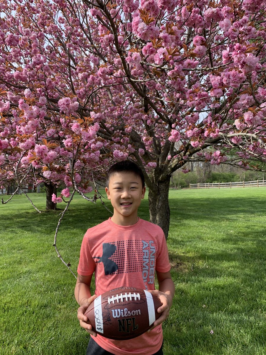 RstoneDuPont's tweet photo. So blessed to see our kids grow.  Nan in 2020, 2019, and 2018 playing football in the back yard.  Pictures taken each year in late April. https://t.co/NM40NfWdeX