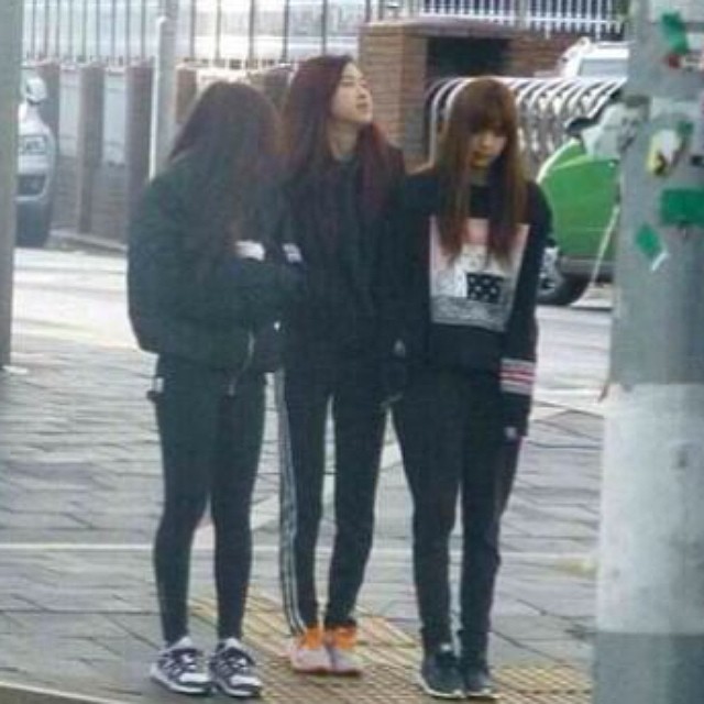 Fantaken of Rosie, Jennie, and Lisa. Just look at the picture, you will know she's the tallest and yeah- I think she was keeping her reddish hair until debut day bcs its always red if im not mistaken.