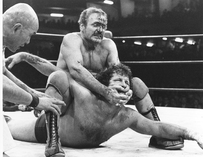 The Sheik was a spry 51 years old at the time of this match, and he starts bleeding almost immediately. Also, I had to show my wife how to block this thread.