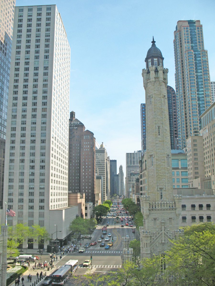 Chicago has many new and widened streets planned. Lewis calls out West 12th ( now  https://en.wikipedia.org/wiki/Roosevelt_Road ) and Michigan Avenue  https://en.wikipedia.org/wiki/Michigan_Avenue_(Chicago) , which will cost many millions.
