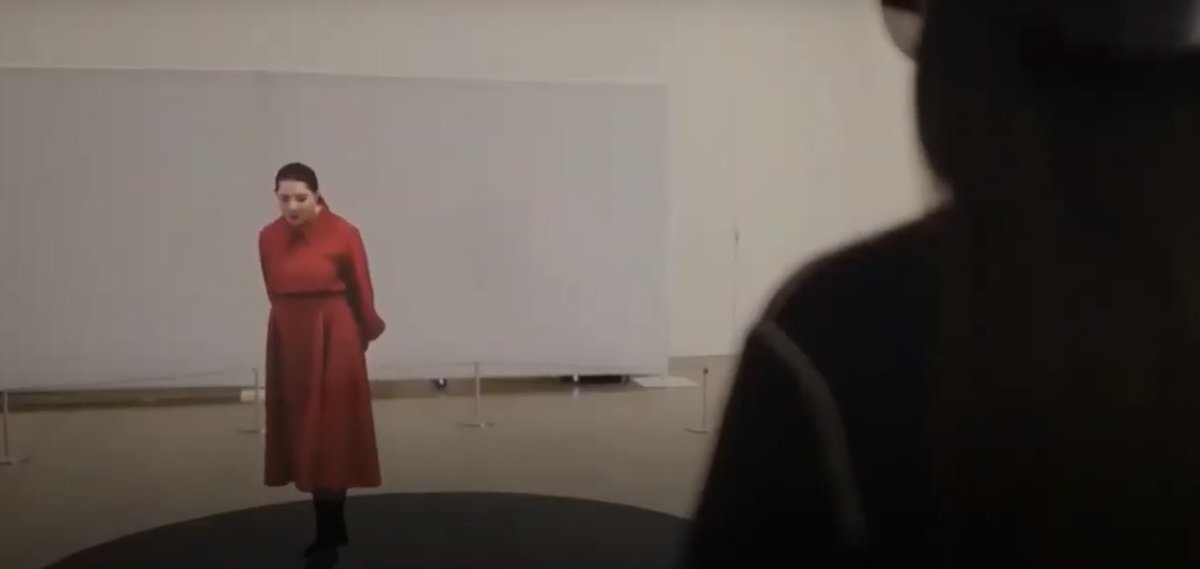 Look at her Microsoft ad again. Abramovic, dressed in black, regards her ghostly VR representation, dressed in red. It seems to me she is confronted with herself as she is in her art, a Scarlet Woman.
