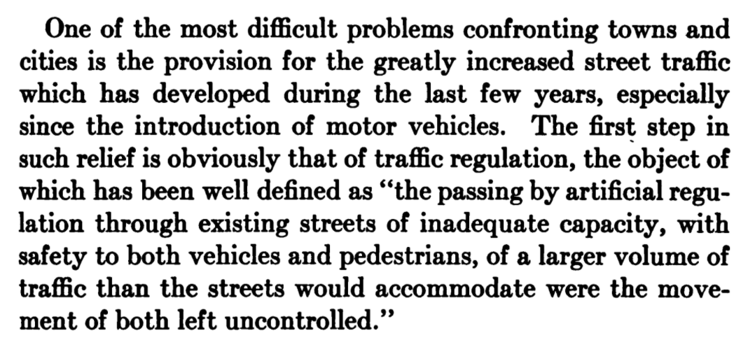 Okay, how do we rebuild our cities for all these new cars? First, "traffic regulation". I think he means clearly marking where cars should go, clear signage, traffic signals, etc. All of this stuff is being made up at this time to run more cars through cities.