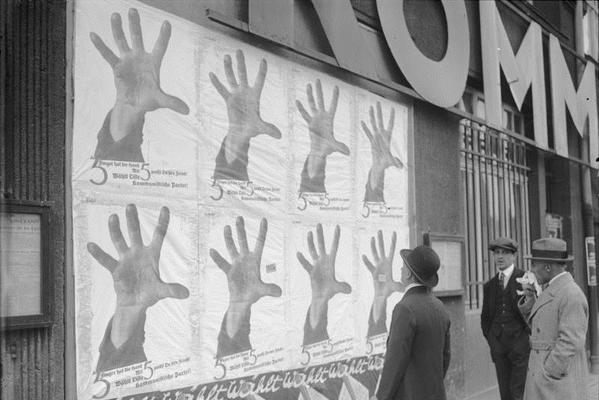 John Heartfield produced the famous 1928 Communist Party election poster "The Hand has Five Fingers" (5)