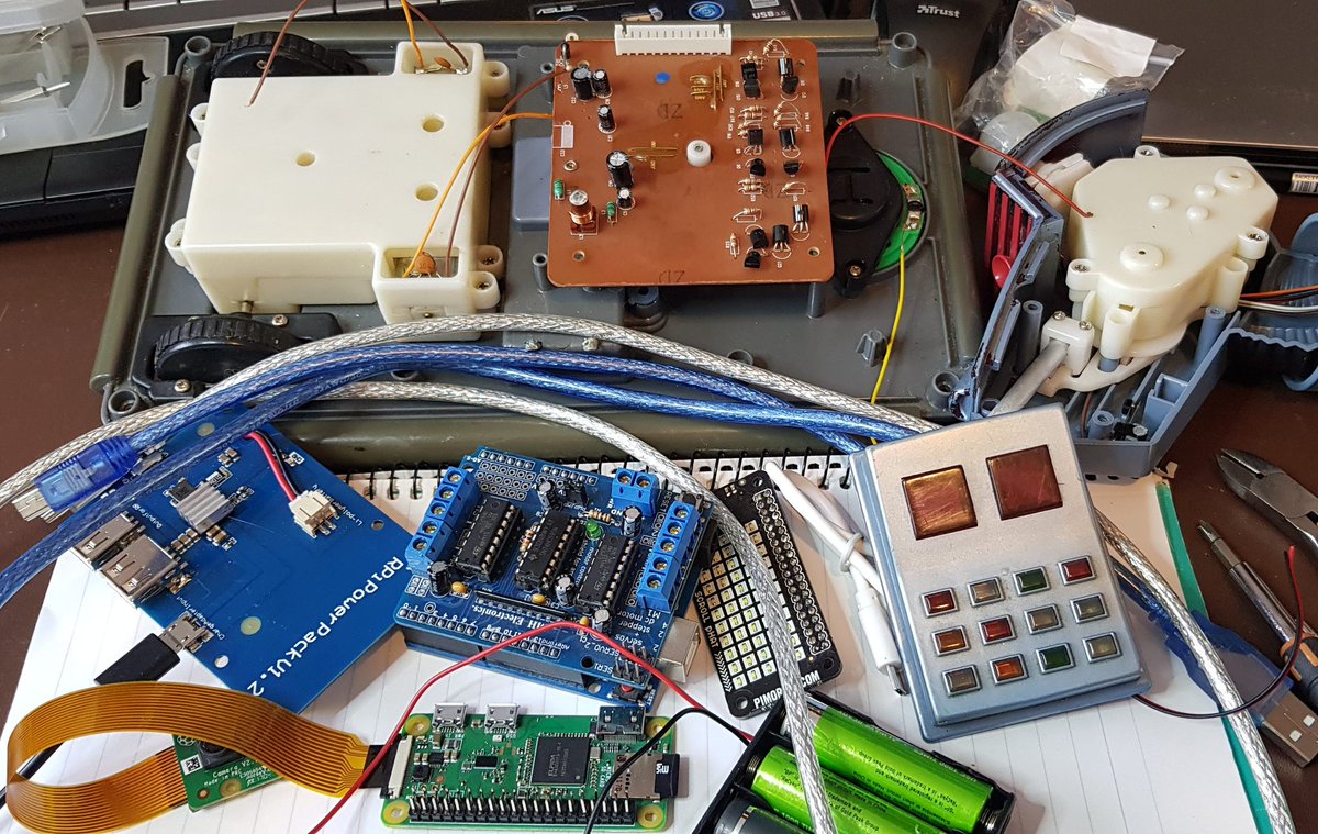 A few bits found to fit into k9. A Pi zero w and an arduino uno and old style motor controller Rpi power pack and some NiMH