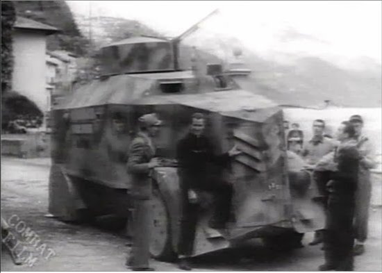 Due to lack of leadership & Mussolini's evident desire to flee rather than fight, these troops dispersed & Pavolini was left with a handful of men & an armoured car (photo). The same night a column of 38 trucks with 200 well armed retreating German troops arrived in Menaggio>> 26