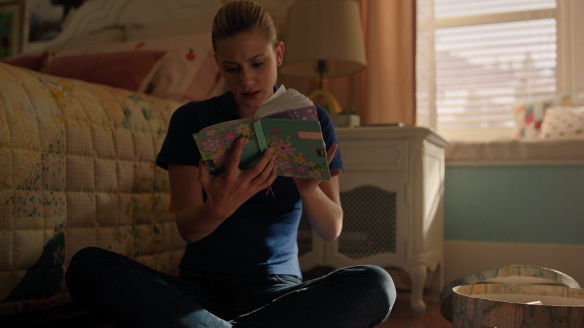 in 4x05 when betty was dealing with figuring out what the serial killer genes are to her, she had a nightmare about killing caramelshe started looking in her childhood diaries and found out her dad made her do it |2