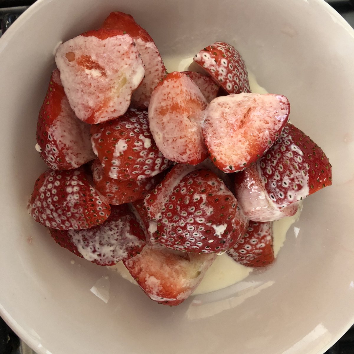Delicious strawberries sprinkled with some caster sugar and coated with double cream! Summer has arrived! 😊❤️