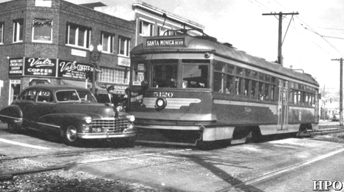 HP_Oliver's tweet photo. #LifeOnTheStrip: Not even a Caddy can take on a PE Red Car. This "oops" is at the corner of Santa Monica and Doheny. (1946) [Image WAPA &amp; HPO https://t.co/wCRvFU2DrK