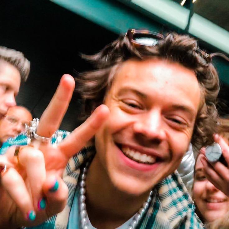 harry being smiley and happy with his nail varnish and rings and pearl necklace and dimples is just... my entire life aesthetic