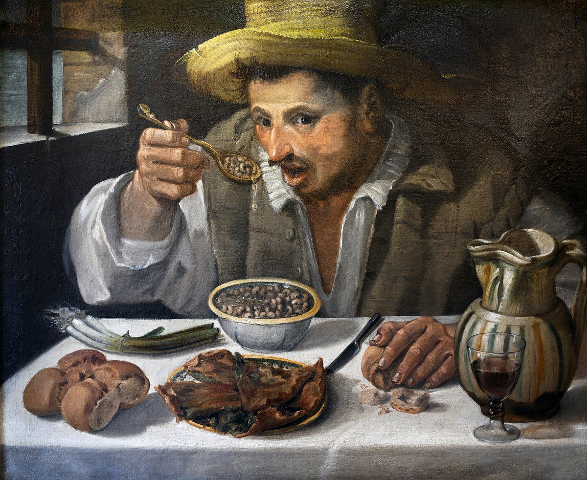 The Bon Appetit Test Kitchen staff recreating scenes from the History of Art, a thread:Carla Lalli Music as 'The Beaneater' by Annibale Carracci