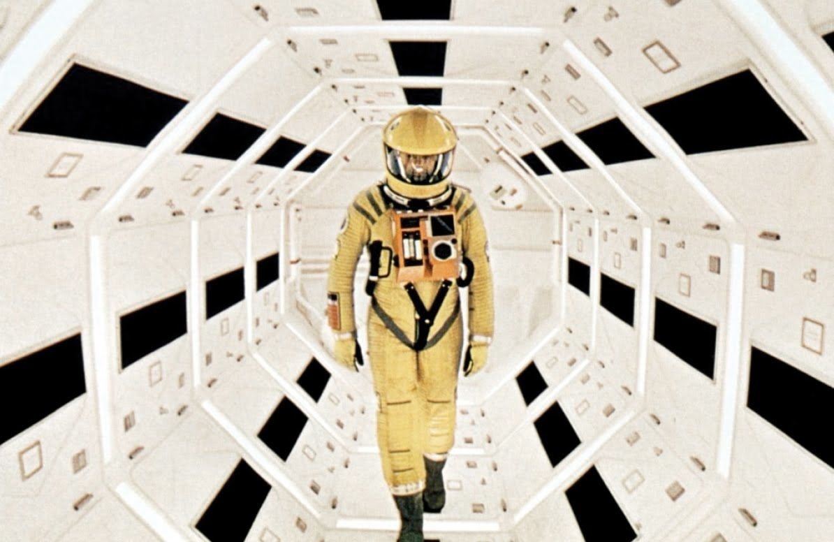 It'd be an amazing coincidence if Baraduke didn't take some inspiration from that Alien image. But were Alien's yellow space suits inspired by 2001: A Space Odyssey?2001 also had red suits. Could this have inspired the yellow/red suit in Metroid? Or just a coincidence?