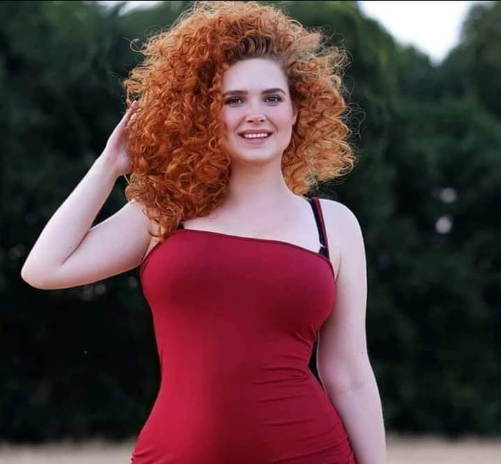 Redhead screaming long hair curvy