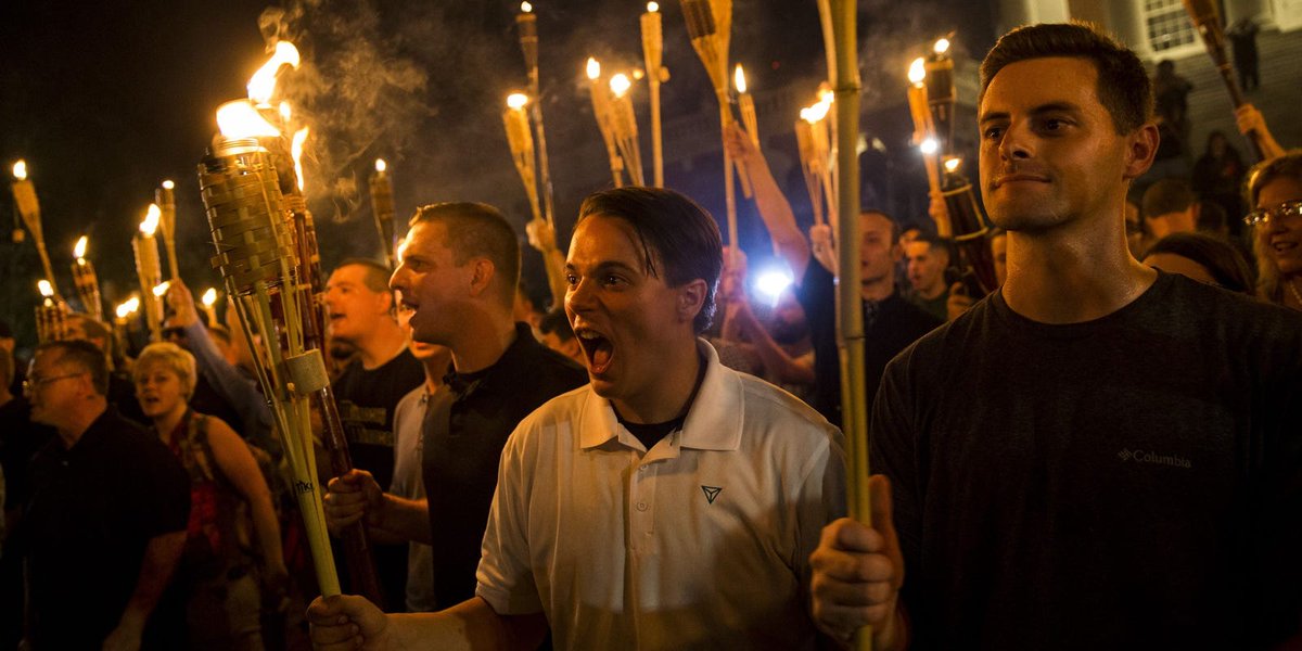 5. The first evening of the event featured a torchlit parade through the university campus, with participants chanting "Jews will not replace us".