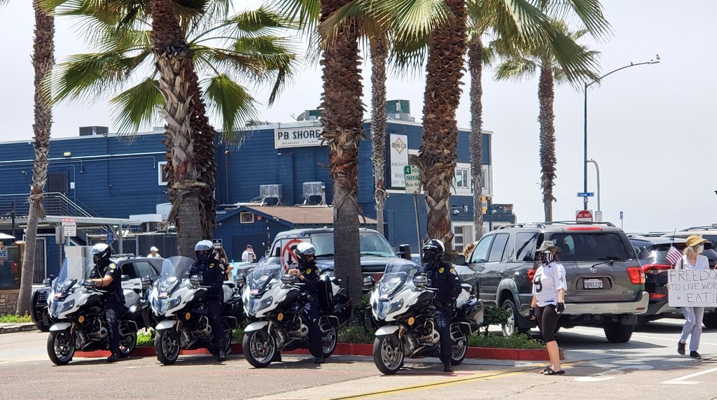 It's a beautiful sunny day here in Pacific Beach, California, where people are demonstrating against the lockdown orders. Protesters are chanting "No New Normal" and "What do want? Freedom. When do we want it? Now."