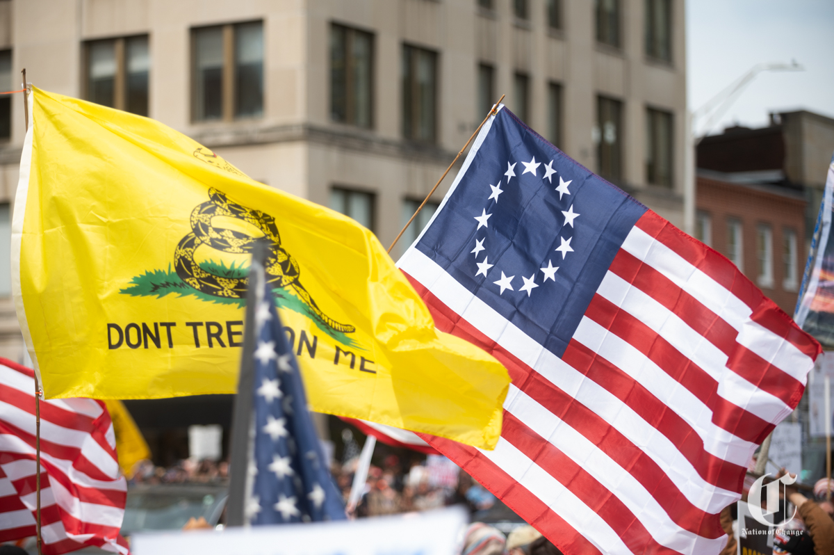 While I didn't see any signs of specific militia/extremist groups a lot of the general signs and flags were there. Any one of these things don't necessarily mean anything, like the don't tread on me flag isn't 'far-right' but it's an indicator... just like the Hawaiin shirts.