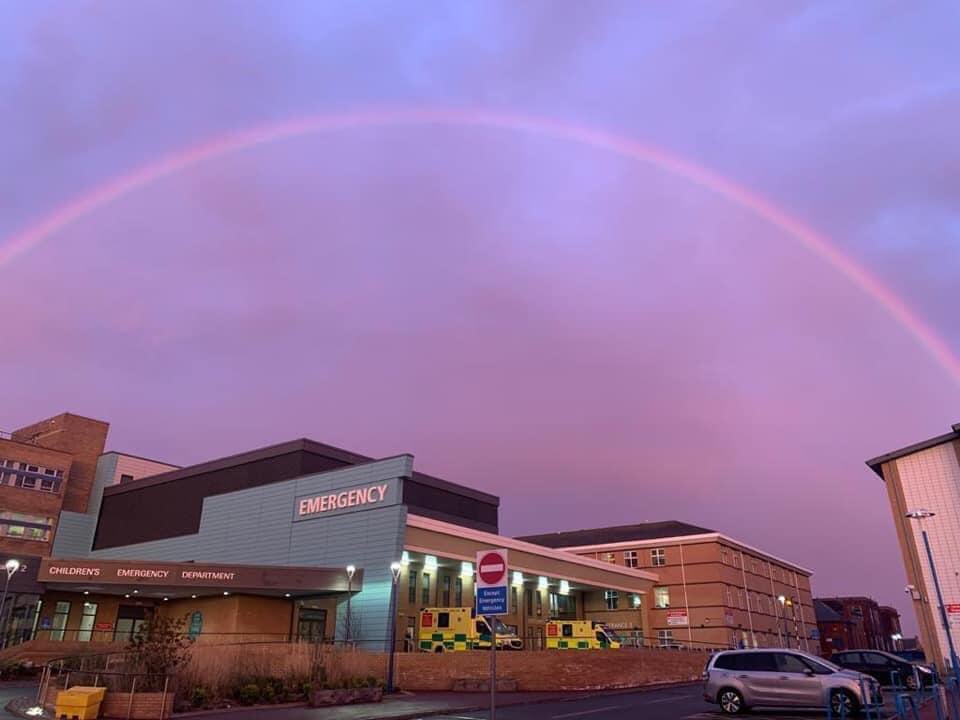 frlydensmith's tweet photo. A rainbow over #Sunderland hospital tonight. While the rainbow has become synonymous with our #NHS during the #COVID19 crisis, it’s a tremendous sign of hope in the darkness, and tonight, a tribute from nature to the wonderful staff 🙂@STSFTrust.  
🌈😷💖🙏 https://t.co/MqfHGo4GHS