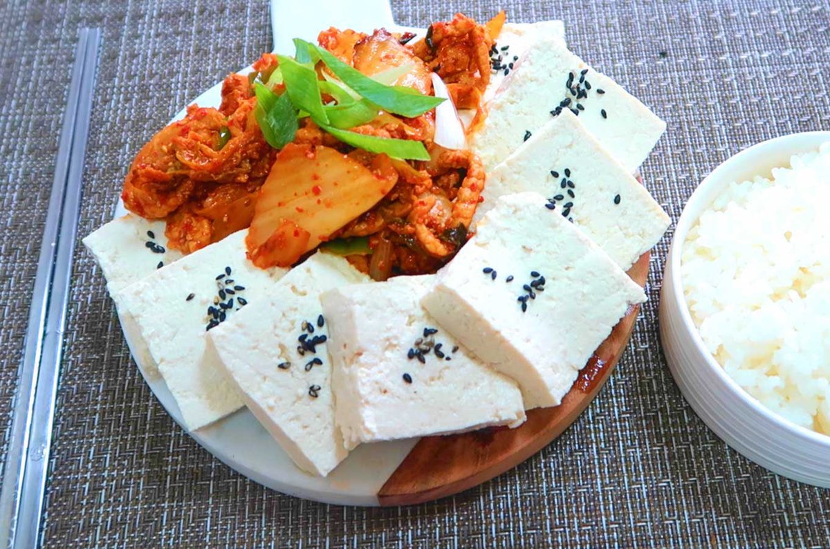 His third dish was not really a dish but more of a side dish Kimchi and tofu it was not order as a jjigae. He literally had tofu and kimchi next to eachother and ate it lovely ! His spread was fantastic from Pork to beef to tofu!  #WhatBTSAte  #IUxSUGA  #EatWhatBTSAte  @BTS_twt