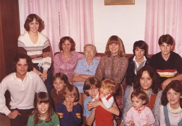 Big Mama was around 90 in this pic. (I'm the girl in green; my brother is navy/white striped izod )the mill houses had large living rooms – built to accommodate caskets, before funeral homes were a thing.Big with the great grands, and a great great grand.