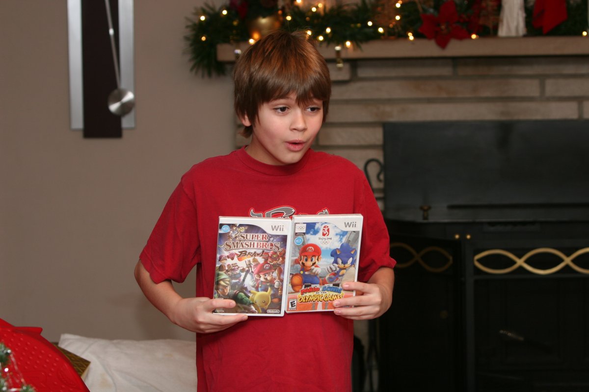 My mom gave me an external hard drive with a bunch of pictures for my birthday. This one is from Christmas 08 when I first got my Wii and Smash Bros Brawl. Honestly one of the best Christmases I ever had.