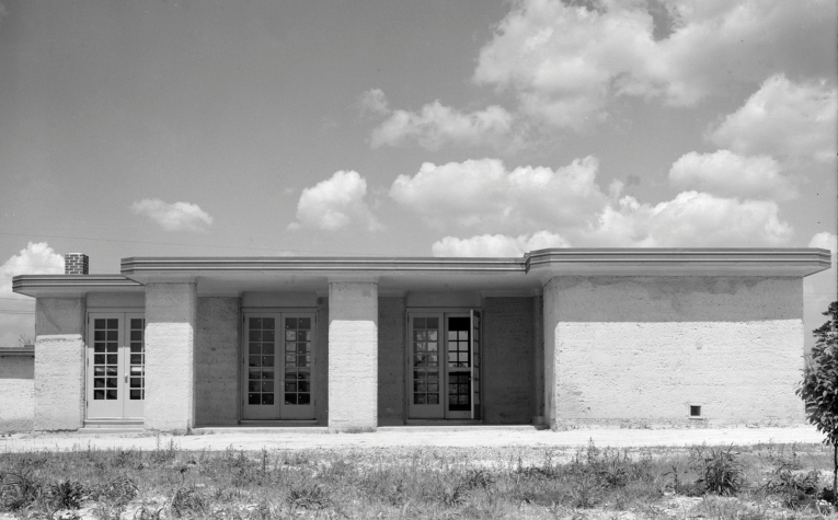 The 1937 Gardendale Project was a trial of rammed earth as a technique used in mass produced affordable homes in Alabama, USA. In terms of cost they were comparable to other building methods of the era but the money was spent on people (labor) rather than factories (material).