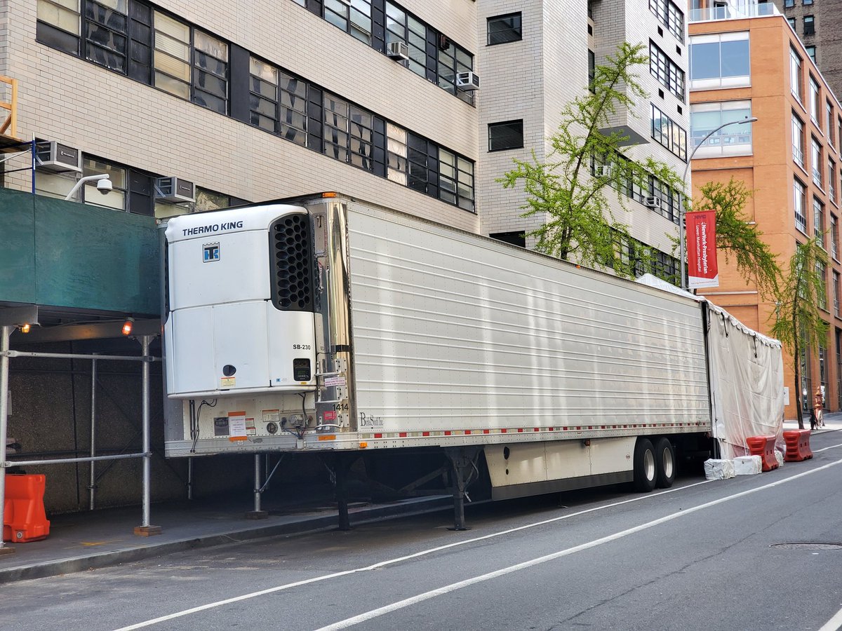janccrc's tweet photo. @errollouis #refridgerated #trucks storing the bodies of beloved New Yorkers. This is why we can't be hasty in encouraging people from the safety of sheltering in place, without universal #covid19 testing. #openstreets whiners should spending their time focused on mass testing measures. https://t.co/R6NyPSsP0k