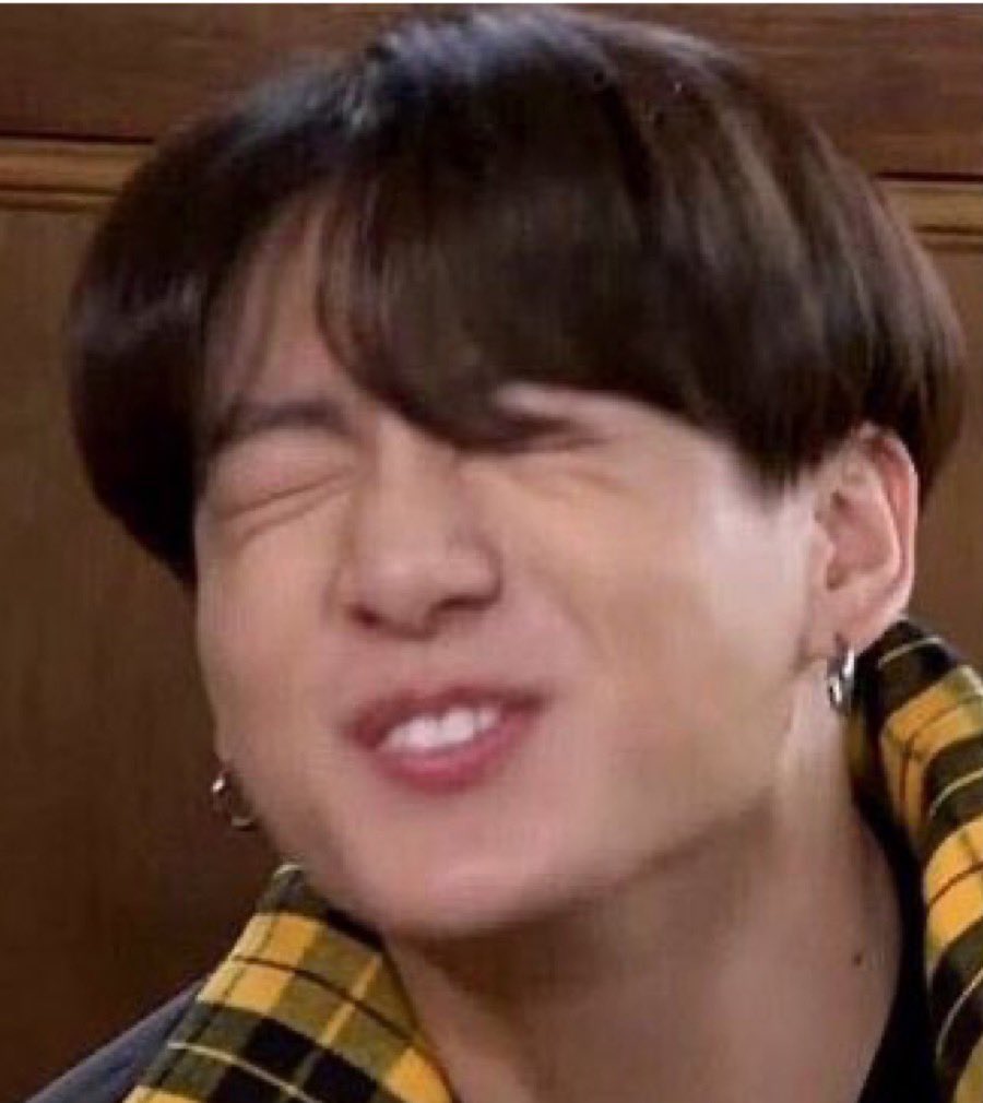 Jungkook exposing his bunny teeth while smiling — a thread