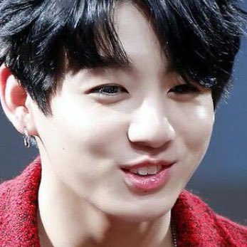 Jungkook exposing his bunny teeth while smiling — a thread