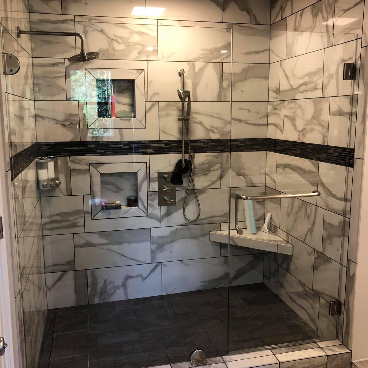 raleightile's tweet photo. Who else likes the idea of floating glass in their shower? We sure do!

#RaleightTile #BathroomGoals https://t.co/DDy8f4OeBG