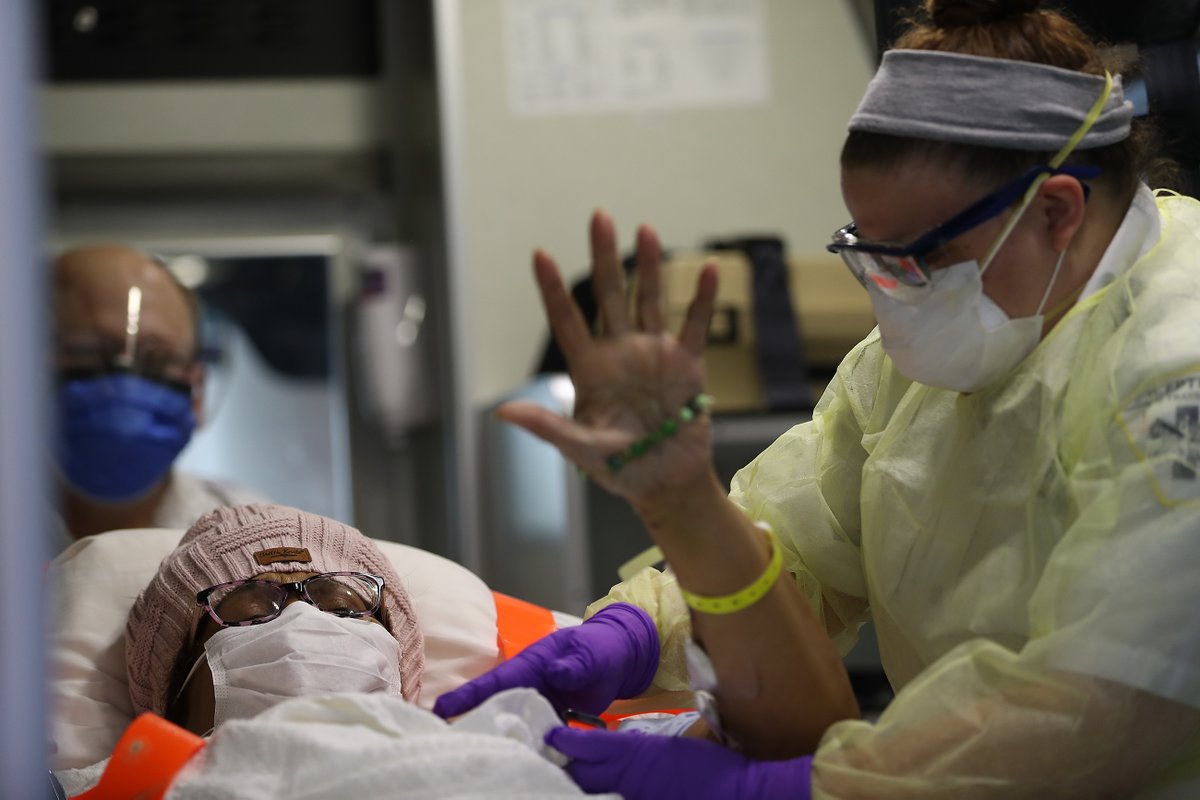 Medical workers cheer as recovering COVID-19 patient, Kim Dobson, 63, is discharged from Virtua Memorial Hospital in Mt. Holly, NJ on April 27, 2020. Dobson was transferred to a rehabilitation center to finish recovery before returning home. #COVID19 #NJ