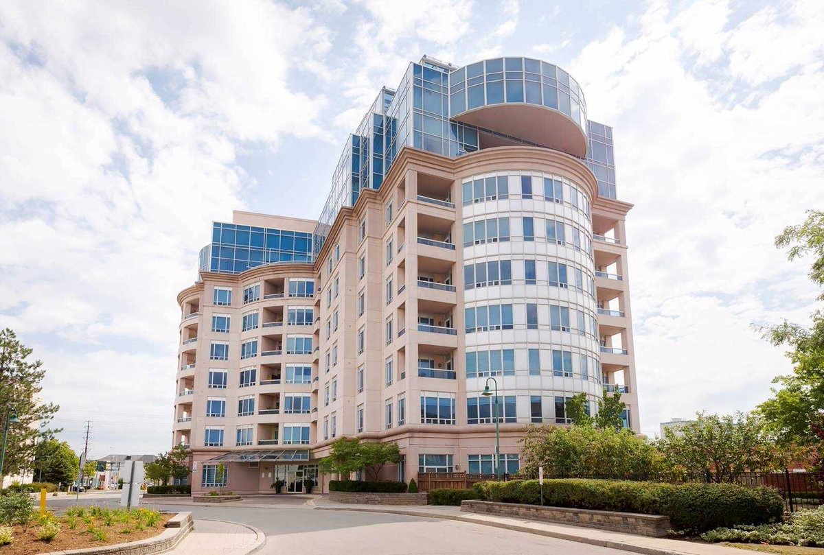 This condo in Vaughan is a terrible building. It looks like what would happen if a suburban office building and a Hilton Garden Inn had a baby.