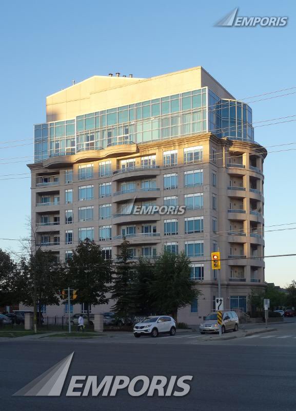 This condo in Vaughan is a terrible building. It looks like what would happen if a suburban office building and a Hilton Garden Inn had a baby.