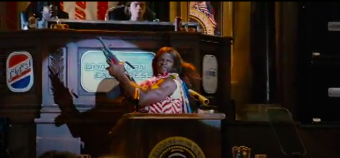 ...President Camacho is willing to admit he can't fix the problems of food shortages and economic devastation by himself, and in a national address, tasks a person smarter than him to solve him problem, albeit with an unreasonable timeframe...