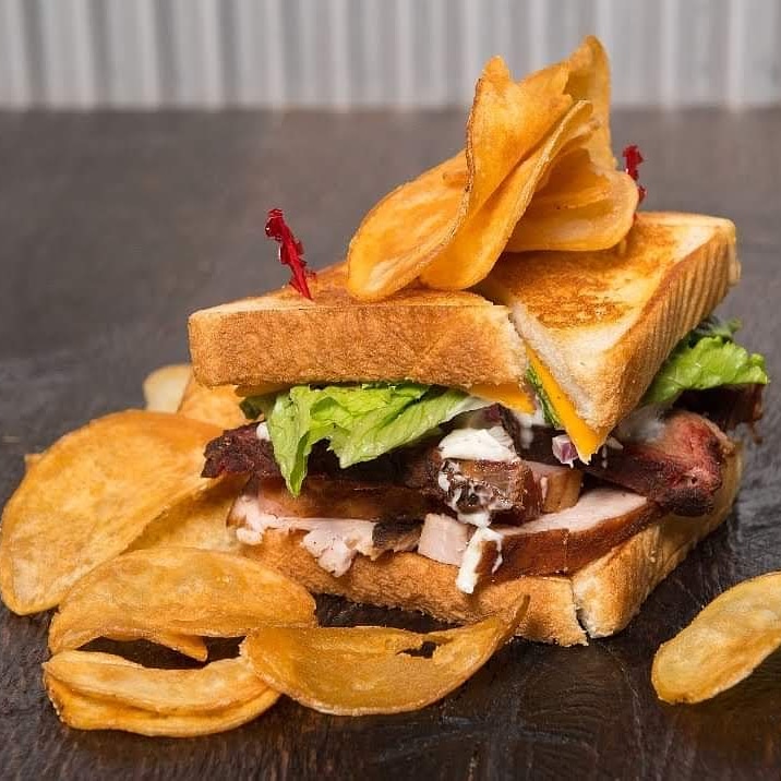 DelanoBBQCo's tweet photo. Oh, yeah...our smoked club sporting brisket, turkey, and ham served on Texas toast with red onion, cheddar, lettuce, tomato, and mayo! Order for curbside pick up by calling 316-260-4950 or ordering online with https://t.co/VDhLcL3brw.
#wichitafoodie #wichitastrong #eatlocalict https://t.co/5jxmVmSpAg