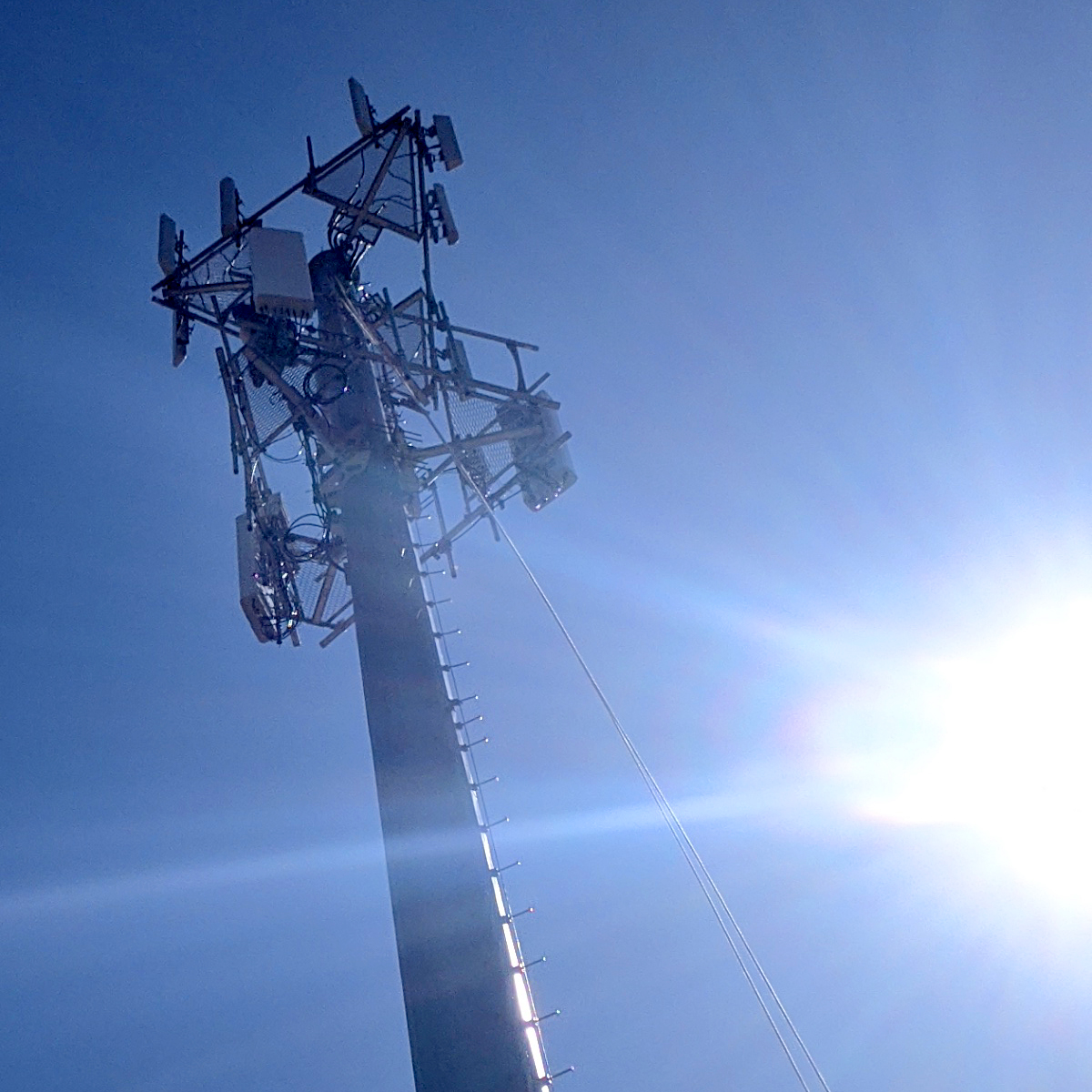 LegacyTowers's tweet photo. Josh is taking in some Wyoming sunshine while replacing a faulty antenna. Yes, you can't always see us (!), but we're out there working to keep your signal strong! #LegacyTowers #WirelessWizards #KeepingYouConnected https://t.co/9Xbew3xCwG