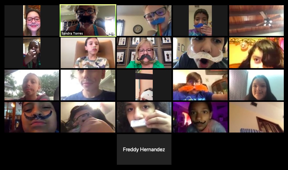 Milam 5th graders sporting their marvelous mustaches during National Library Week! 💙🧡💙