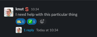 Slack message with emoji reactions