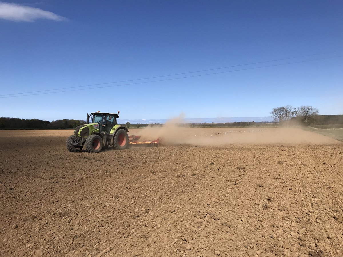 Finishing sowing grass in a dust bowl, praying for rain for crops and grass. Floods seem a long time ago.