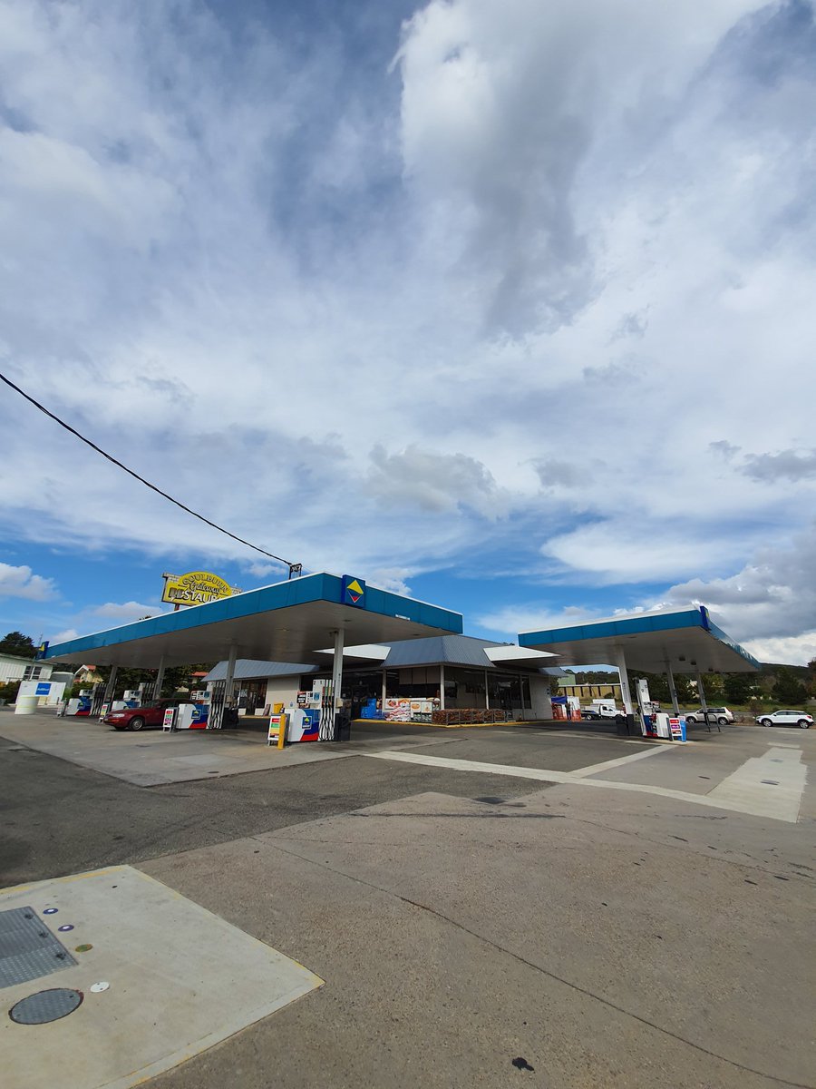 evcricket's tweet photo. Not obvious to the casual observer, but this is the most technically advanced petrol station in Australia right now. 750kW of EV charging, 250kW/273kWh of battery storage and all sorts of other cool electrical hardware. https://t.co/ZdimIlRZPr